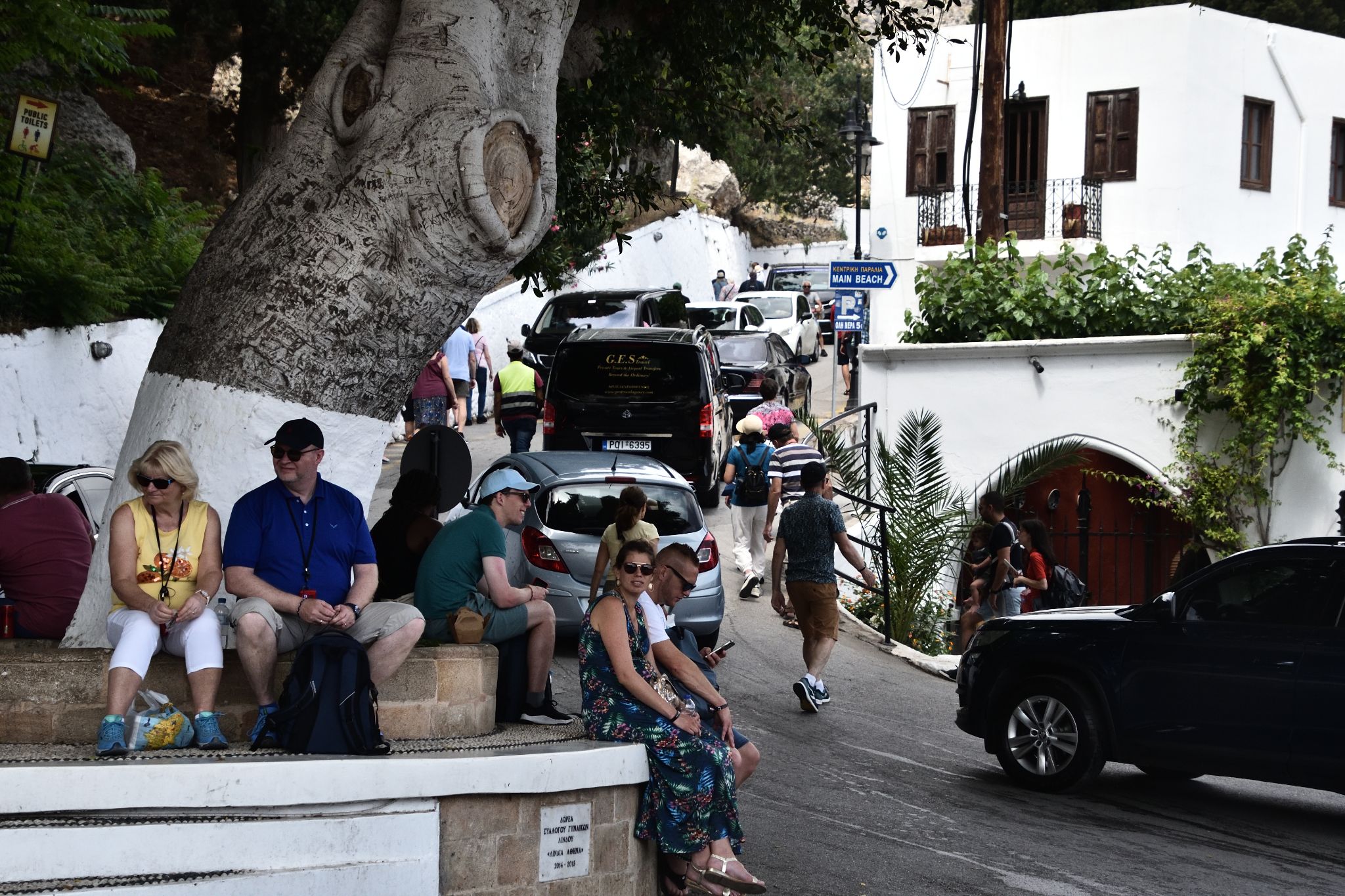 Waiting for a ride to the top of the hill where the busses were parked